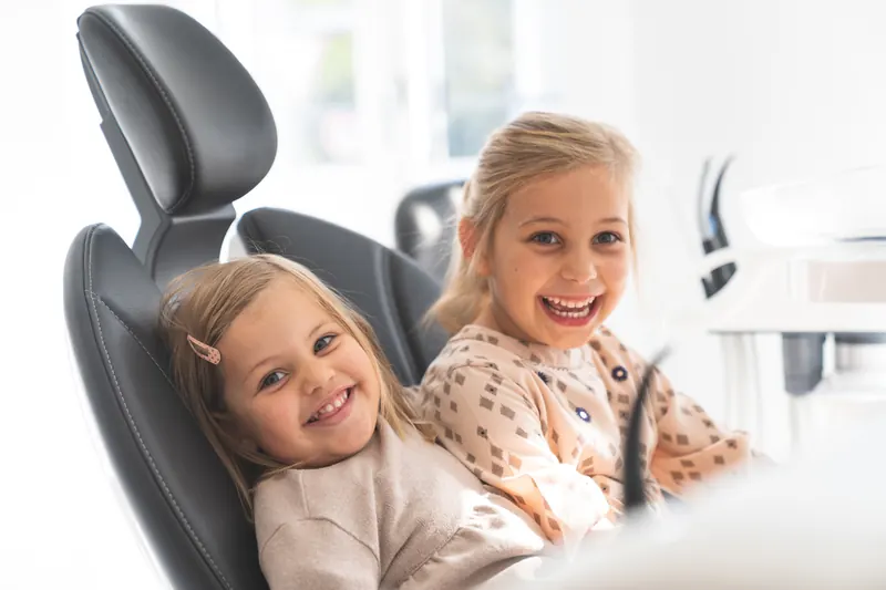 Two girls in the treatment chair